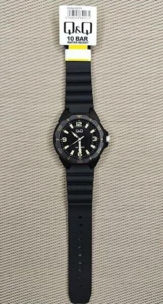 Q&Q VS44J007Y Fosforlu Silikon 10 Bar Su Geçirmez Genç Kol Saati