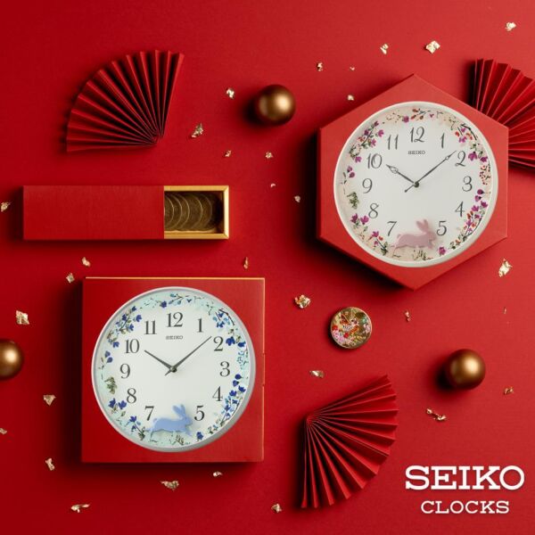 Seiko QXC238W Plastik Kasa Beyaz Renkli 33 cm Çaplı Tavşan Figürlü Sarkaçlı Modern Sessiz Saniye Mekanizmalı Duvar Saati