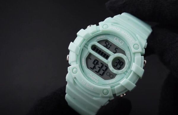 Q&Q G15A-002VY Yeşil Renkli Alarmlı Tarihli Kronometreli Işıklı Çocuk Kol Saati