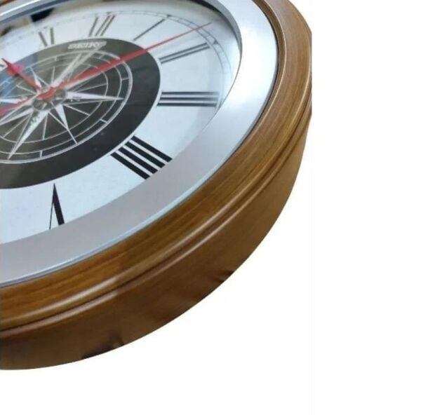 Seiko QXA844G Plastik Kasa Kahverengi Renkli 35 cm Çaplı Pusula Kadranlı Quartz Mekanizmalı Duvar Saati