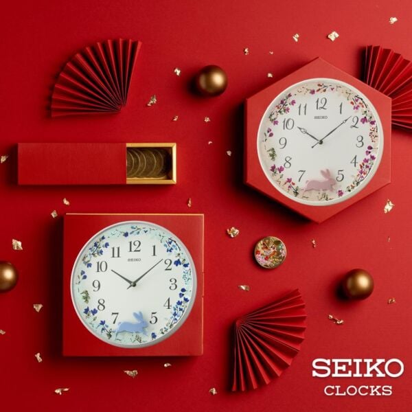 Seiko QXC238N Plastik Kasa Beyaz Renkli 33 cm Çaplı Tavşan Figürlü Sarkaçlı Modern Sessiz Saniye Mekanizmalı Duvar Saati